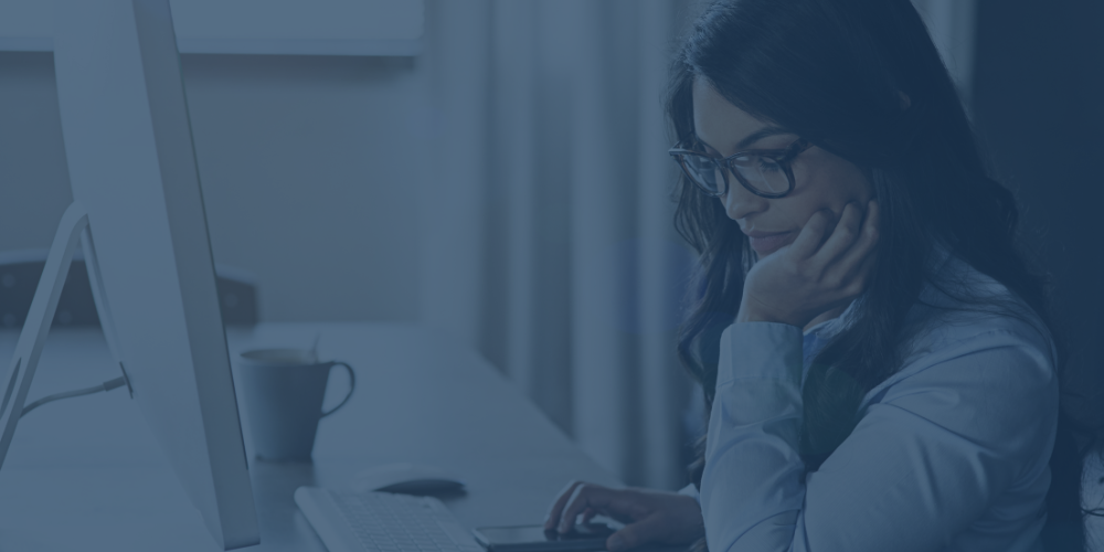 Female investor reviewing cyber due diligence to ensure she makes a smart investment decision